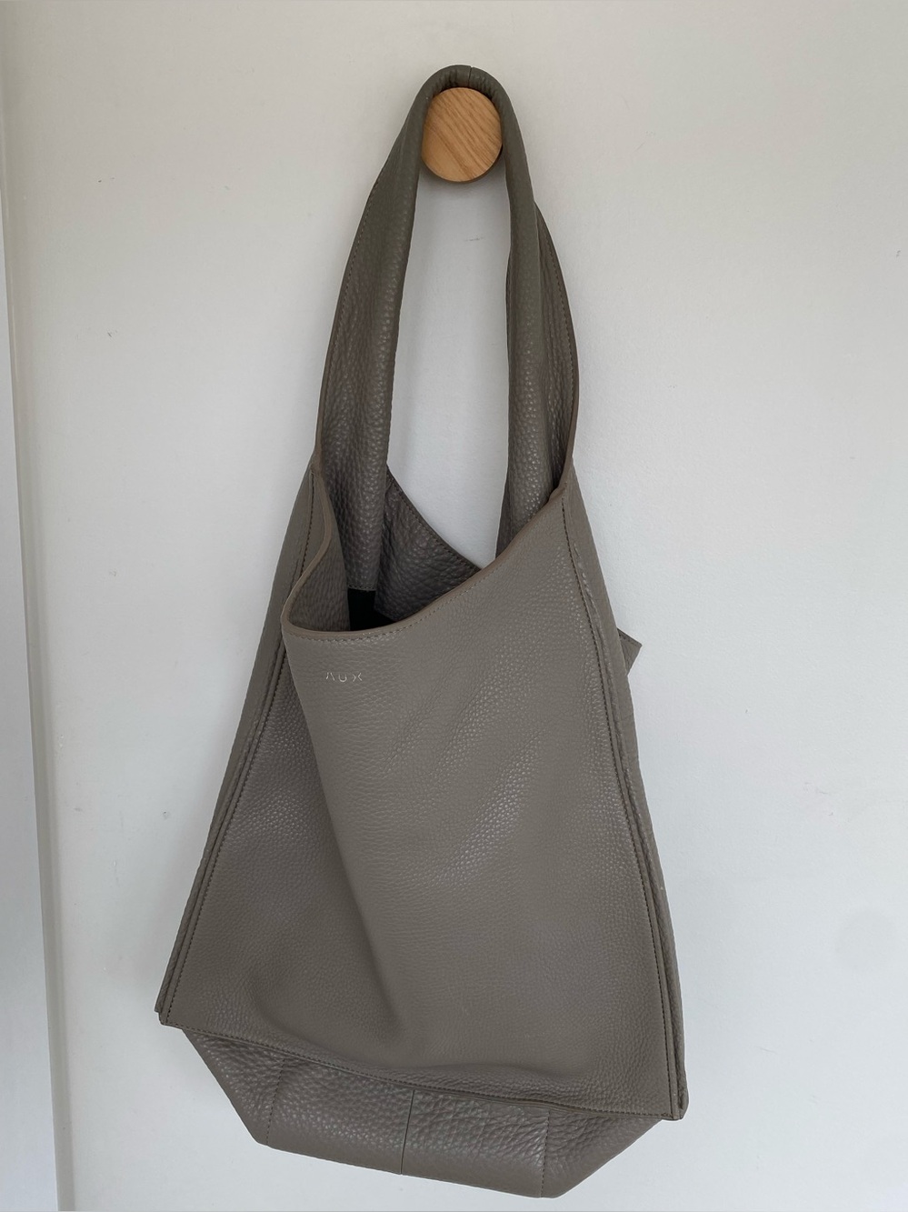 Slouchy gray tote bag by Auxiliary